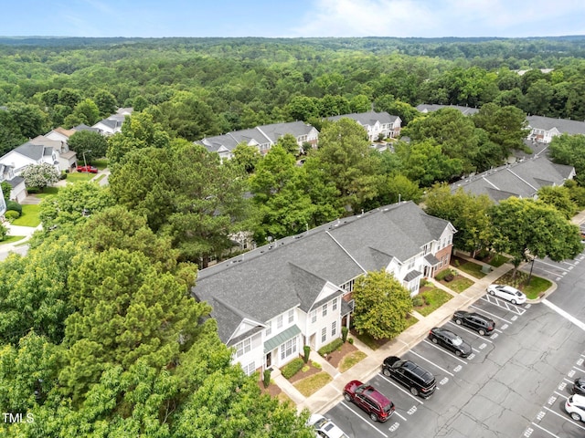 5717 Corbon Crest Ln, Raleigh, NC 27612 - aerial perspective of suburban area with a heavily wooded area
