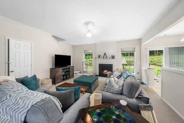 306 Berlin Way, Morrisville, NC 27560 - carpeted living area featuring a large fireplace and baseboards