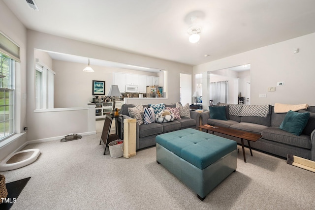 306 Berlin Way, Morrisville, NC 27560 - living area with light carpet and baseboards