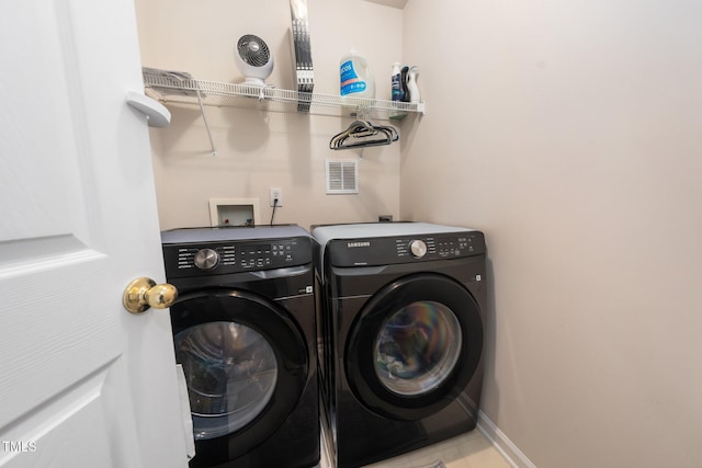 306 Berlin Way, Morrisville, NC 27560 - washroom featuring washing machine and dryer, tile patterned floors, and baseboards
