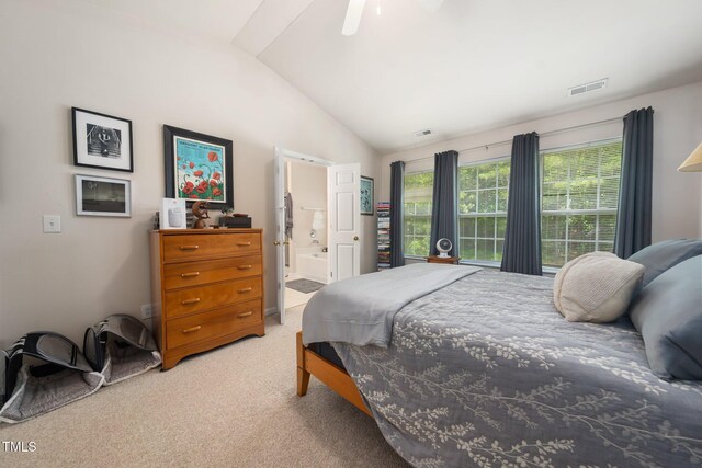 306 Berlin Way, Morrisville, NC 27560 - bedroom featuring light colored carpet, vaulted ceiling, and ensuite bath