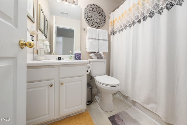 306 Berlin Way, Morrisville, NC 27560 - bathroom with tile patterned flooring, toilet, vanity, and a shower with curtain