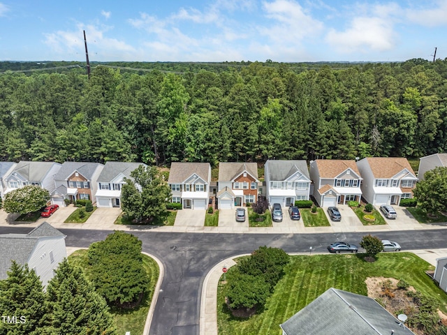 306 Berlin Way, Morrisville, NC 27560 - aerial perspective of suburban area featuring a heavily wooded area