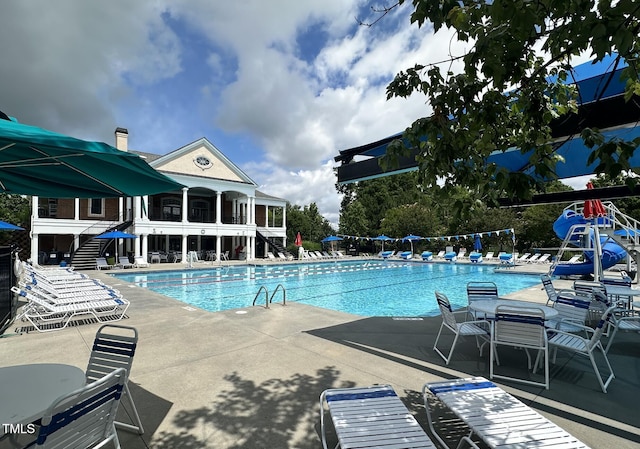 306 Berlin Way, Morrisville, NC 27560 - community pool featuring stairs and a patio