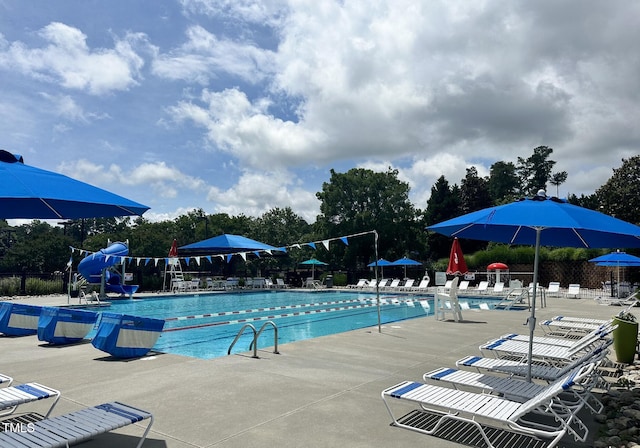 306 Berlin Way, Morrisville, NC 27560 - community pool featuring a patio and a water slide