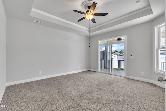 1217 Linkwood Way, Fuquay Varina, NC 27526 - carpeted empty room with a raised ceiling, ceiling fan, ornamental molding, and baseboards