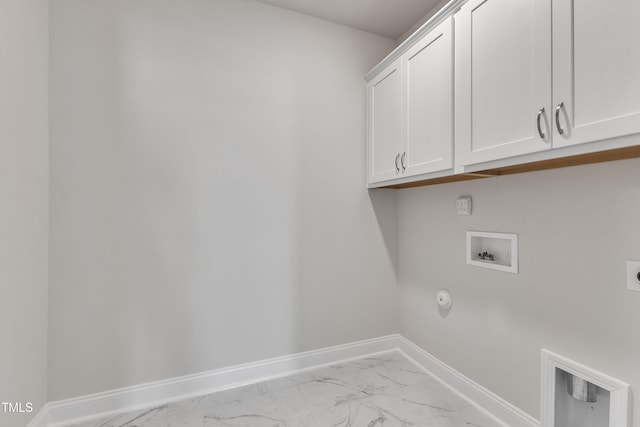 1217 Linkwood Way, Fuquay Varina, NC 27526 - laundry area featuring cabinet space, hookup for a washing machine, light marble finish flooring, and gas dryer hookup