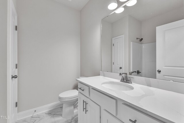 1217 Linkwood Way, Fuquay Varina, NC 27526 - bathroom featuring vanity, toilet, marble look tile flooring, baseboards, and a shower