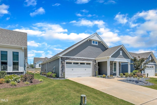 1217 Linkwood Way, Fuquay Varina, NC 27526 - view of front of property featuring driveway, a front lawn, an attached garage, and stone siding