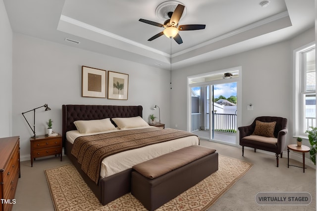 1217 Linkwood Way, Fuquay Varina, NC 27526 - bedroom with a raised ceiling, access to outside, multiple windows, and ornamental molding