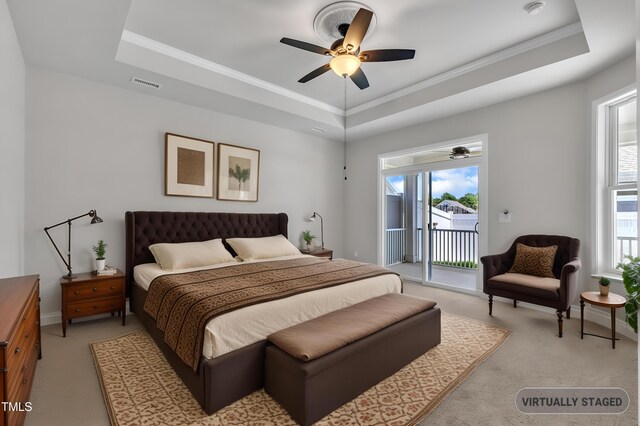 1217 Linkwood Way, Fuquay Varina, NC 27526 - bedroom with a raised ceiling, access to outside, multiple windows, and ornamental molding