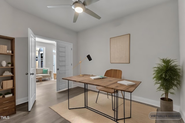 1217 Linkwood Way, Fuquay Varina, NC 27526 - home office with ceiling fan, wood finished floors, and baseboards