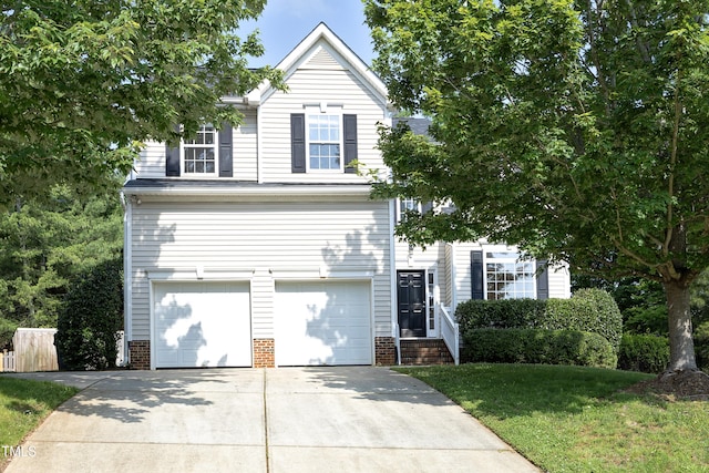 803 High Ct, Hillsborough, NC 27278 - view of front of property featuring an attached garage, driveway, and a front lawn