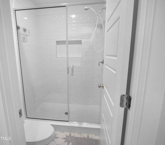 1534 Millrock Trl, Wendell, NC 27591 - bathroom featuring a shower stall and toilet