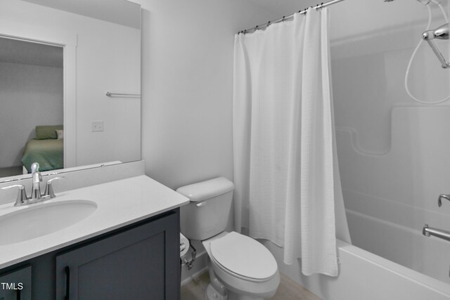 1534 Millrock Trl, Wendell, NC 27591 - full bathroom featuring vanity, toilet, and shower / bath combo with shower curtain