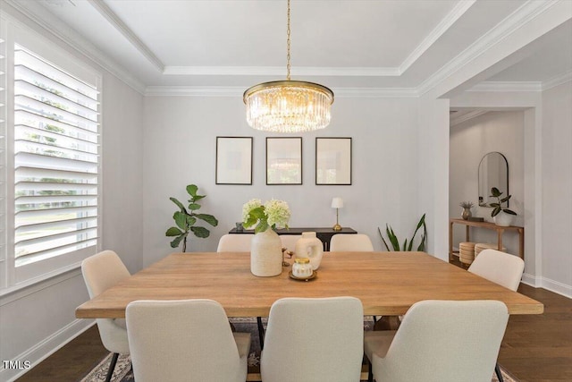 74 Permit Ct, Chapel Hill, NC 27517 - dining area with dark wood-style flooring, a chandelier, plenty of natural light, baseboards, and ornamental molding