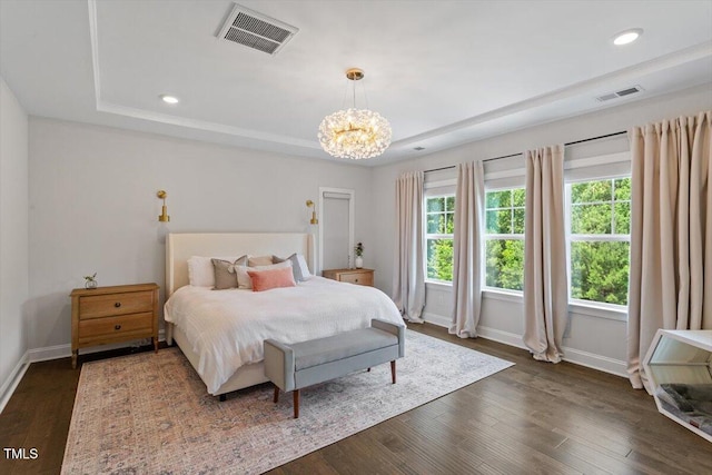 74 Permit Ct, Chapel Hill, NC 27517 - bedroom featuring a raised ceiling, baseboards, recessed lighting, dark wood finished floors, and a chandelier