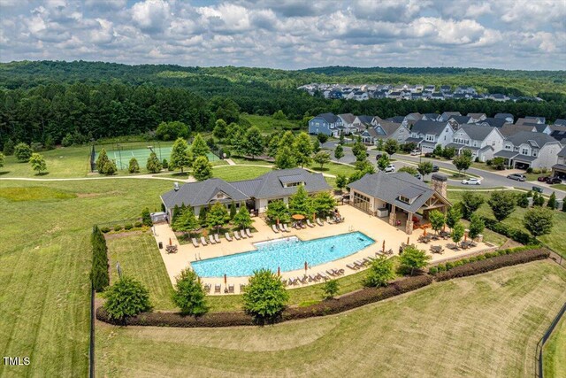 74 Permit Ct, Chapel Hill, NC 27517 - drone / aerial view of a pool and a heavily wooded area