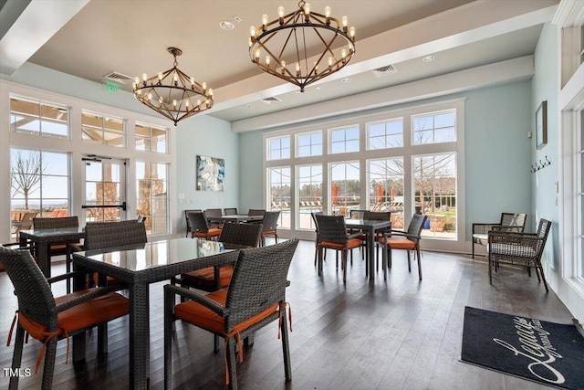 74 Permit Ct, Chapel Hill, NC 27517 - dining space with a chandelier, dark wood-type flooring, a towering ceiling, and recessed lighting