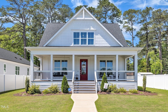 1230 S 2nd St, Smithfield, NC 27577 - view of front of home with roof with shingles, a porch, and board and batten siding