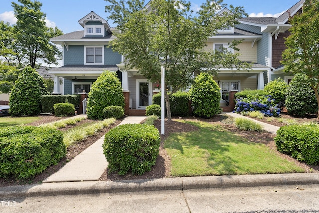 1154 Bungalow Park Dr, Apex, NC 27502 - view of front facade featuring a shingled roof and a front lawn