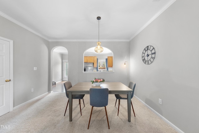 1154 Bungalow Park Dr, Apex, NC 27502 - carpeted dining area with arched walkways, ornamental molding, and baseboards