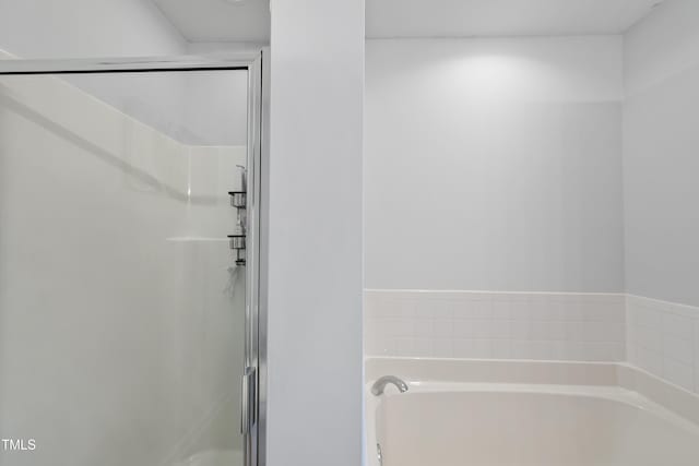 1154 Bungalow Park Dr, Apex, NC 27502 - bathroom with a shower stall and a garden tub