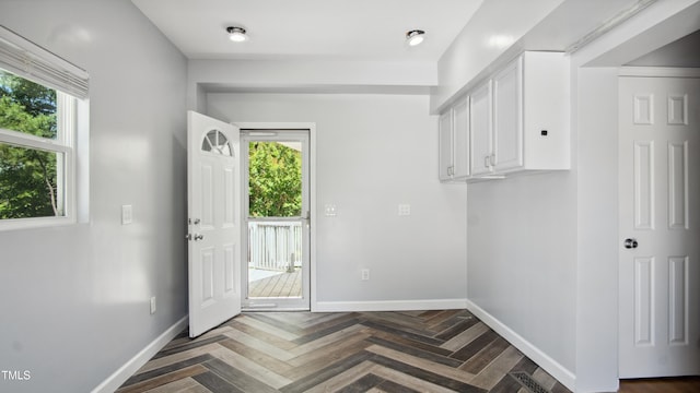 5820 Wake Forest Highway, Durham, NC 27703 - laundry area featuring plenty of natural light and baseboards