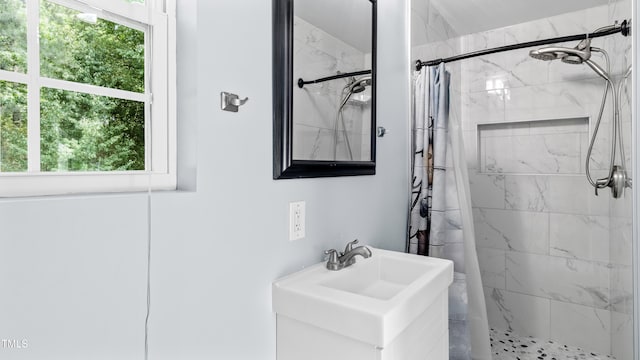 5820 Wake Forest Highway, Durham, NC 27703 - bathroom featuring a marble finish shower and vanity
