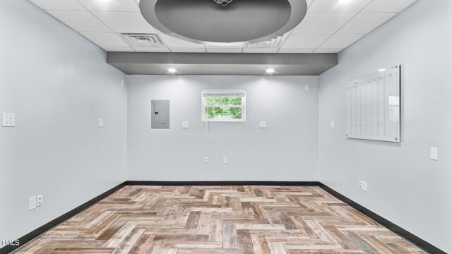 5820 Wake Forest Highway, Durham, NC 27703 - empty room with electric panel, baseboards, and a paneled ceiling