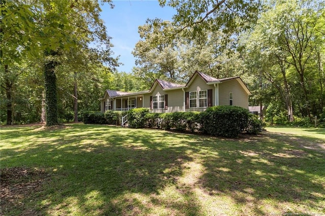 21621 Old Maxton Rd, Maxton, NC 28364 - view of front facade with a front lawn