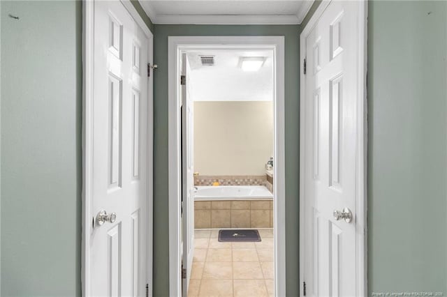 21621 Old Maxton Rd, Maxton, NC 28364 - hall featuring light tile patterned floors and ornamental molding