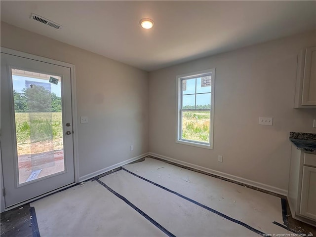 112 Dalton Dr, Lumber Bridge, NC 28357 - unfurnished dining area featuring baseboards