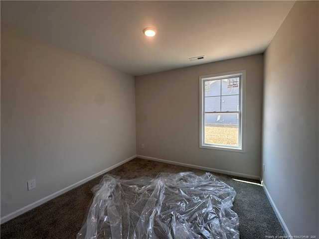 112 Dalton Dr, Lumber Bridge, NC 28357 - carpeted empty room featuring baseboards