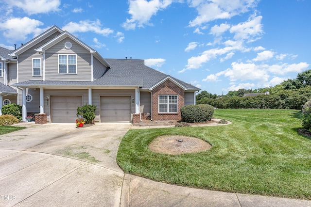 2761 Andover Glen Rd, Raleigh, NC 27604 - view of front of home featuring concrete driveway, brick siding, a front lawn, and a shingled roof