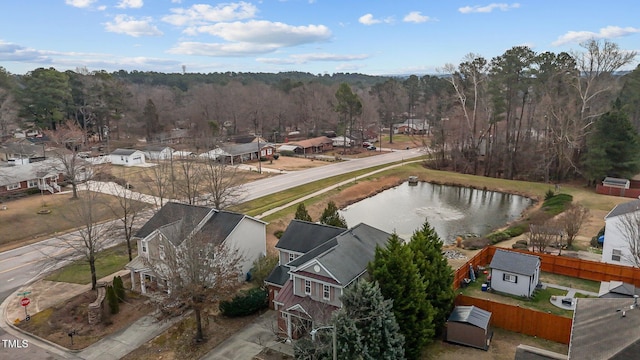 1104 Pebblestone Dr, Durham, NC 27703 - aerial view of residential area with a large body of water and a forest