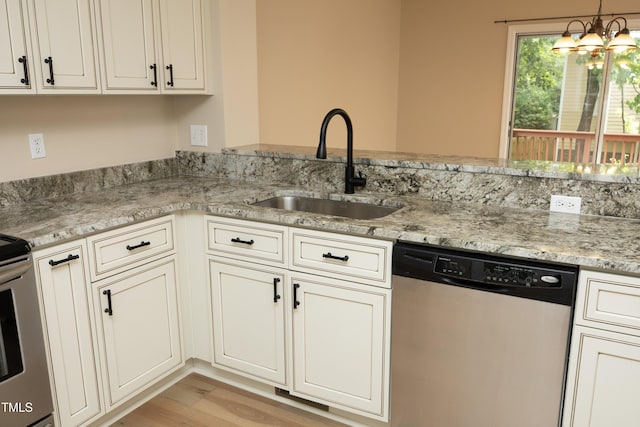 105 Old Dock Trl, Cary, NC 27519 - kitchen with dishwasher, a sink, light wood-type flooring, light stone counters, and decorative light fixtures
