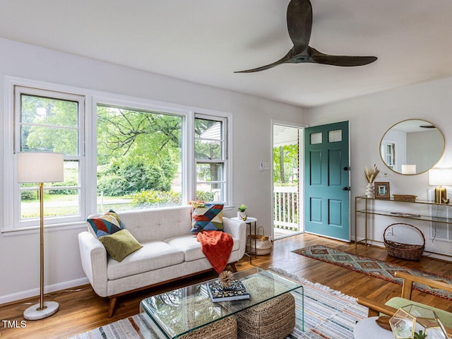 114 Brenrose Cir, Durham, NC 27705 - living area with a ceiling fan, wood finished floors, and baseboards