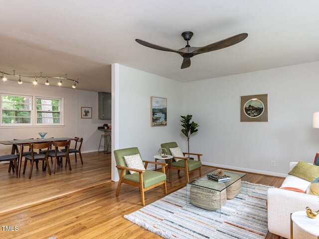 114 Brenrose Cir, Durham, NC 27705 - living room with light wood-style floors, ceiling fan, and baseboards