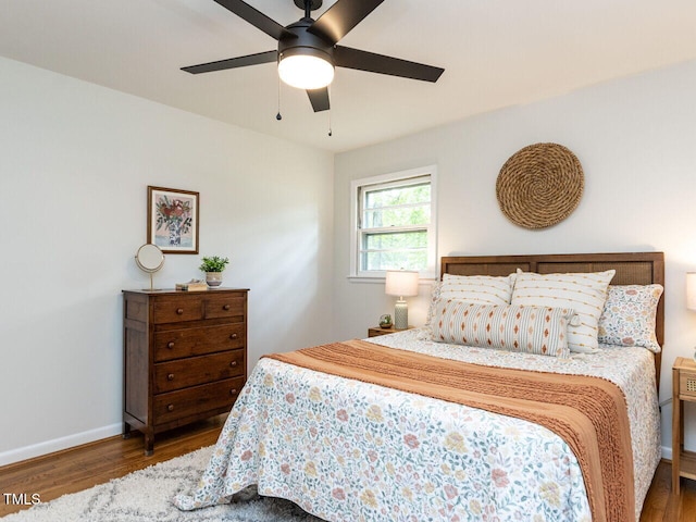 114 Brenrose Cir, Durham, NC 27705 - bedroom with wood finished floors, baseboards, and a ceiling fan