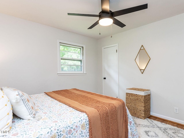 114 Brenrose Cir, Durham, NC 27705 - bedroom featuring wood finished floors, baseboards, and ceiling fan