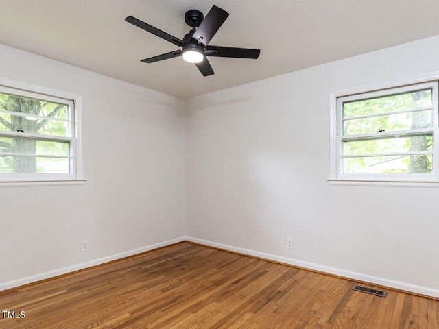 114 Brenrose Cir, Durham, NC 27705 - unfurnished room featuring light wood-style floors, baseboards, and ceiling fan