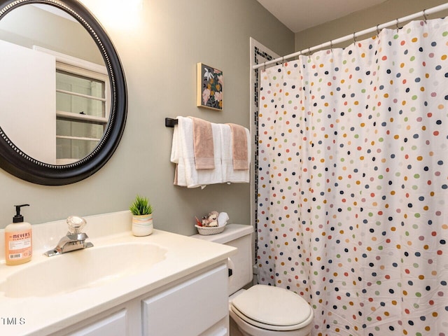 114 Brenrose Cir, Durham, NC 27705 - bathroom featuring vanity, toilet, and a shower with curtain