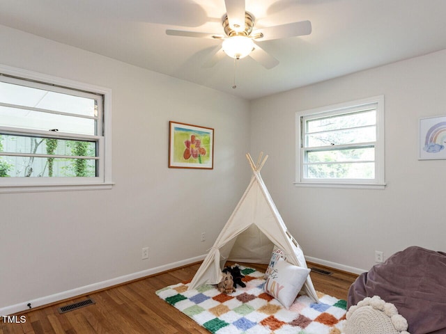 114 Brenrose Cir, Durham, NC 27705 - game room with a ceiling fan, baseboards, and wood finished floors