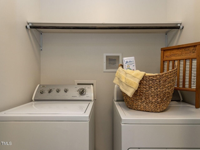 114 Brenrose Cir, Durham, NC 27705 - washroom with washer and clothes dryer