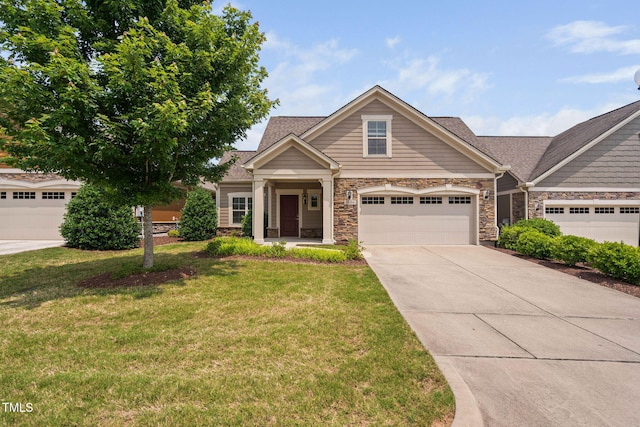 1604 Vineyard Mist Dr, Cary, NC 27519 - craftsman inspired home with stone siding, driveway, a front yard, and an attached garage
