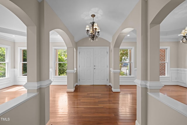 7409 Chesley Ln, Durham, NC 27713 - foyer featuring a chandelier, wood finished floors, and crown molding