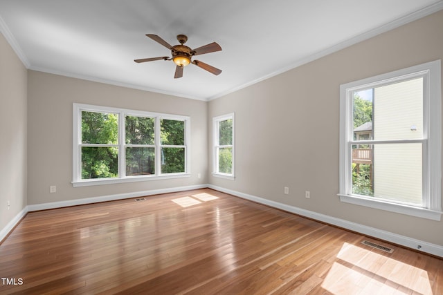 7409 Chesley Ln, Durham, NC 27713 - unfurnished room with baseboards, ornamental molding, wood finished floors, and ceiling fan