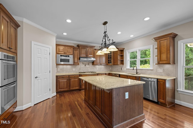 7409 Chesley Ln, Durham, NC 27713 - kitchen with appliances with stainless steel finishes, under cabinet range hood, dark wood finished floors, open shelves, and brown cabinets