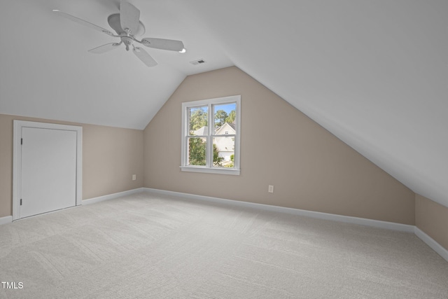 7409 Chesley Ln, Durham, NC 27713 - additional living space with light colored carpet, lofted ceiling, baseboards, and ceiling fan